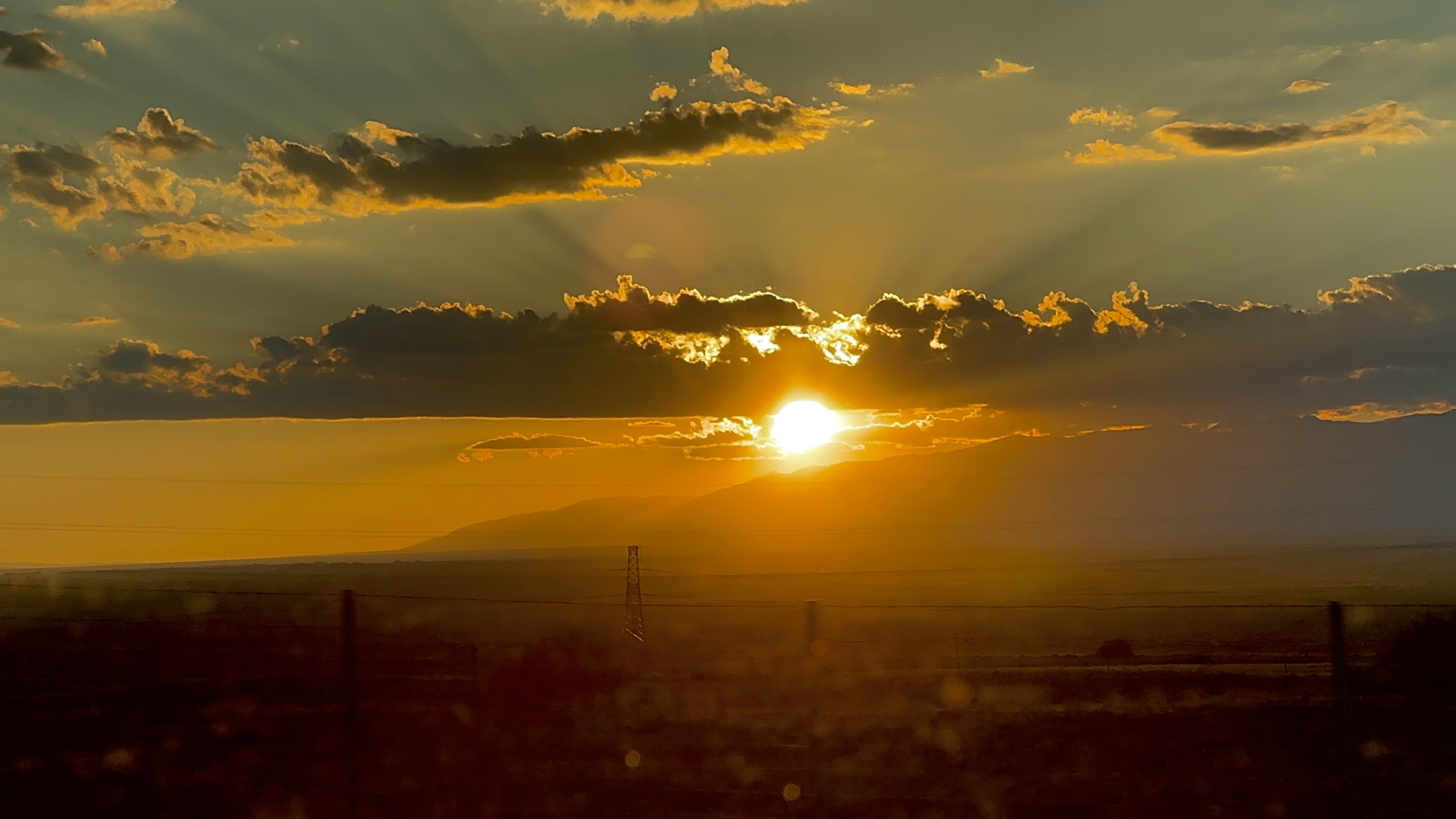 Golden sunset over hills in Xinjiang